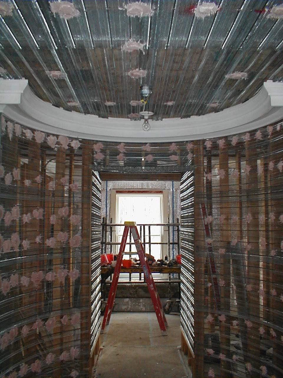 Expanded ribbed galvanized lath on the upstairs oval hall before plastering